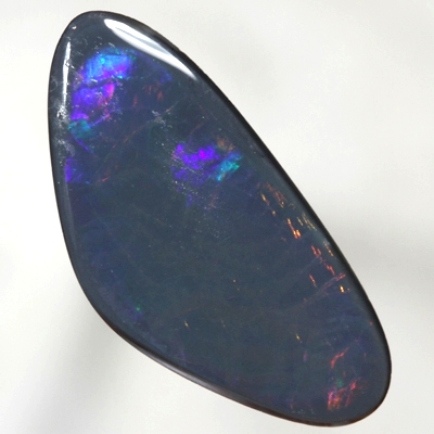 SOLID BLACK OPAL Fishscale Harlequin pattern showing red through to royal blue